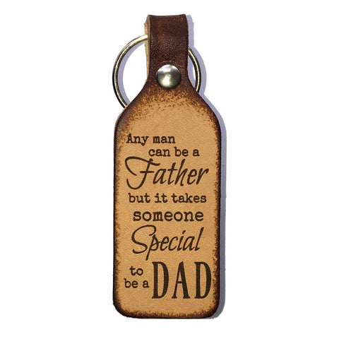 Any Man Can Be a Father Leather Engraved Keychain